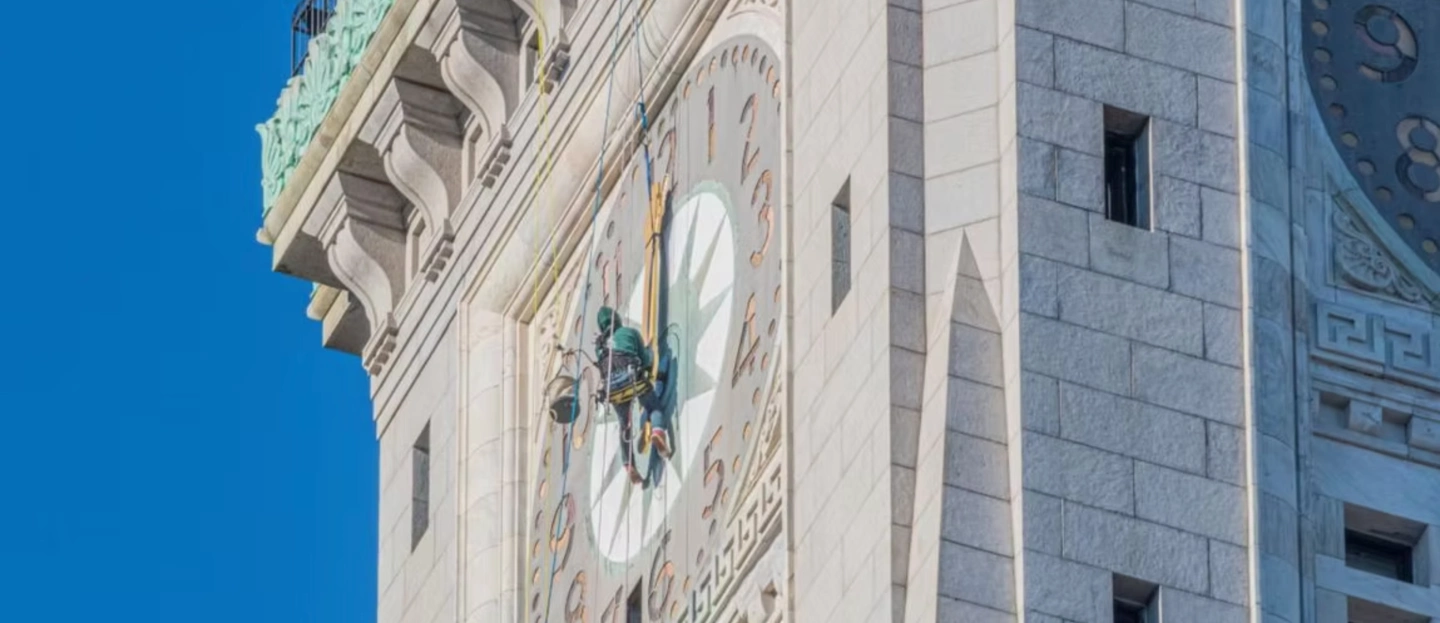 KBC Replaces Clock Hands on Marriott Custom House